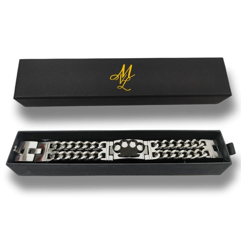 Bracciale Mi Vida Loca MVL argento/nero con placca logo MVL nera nella confezione regalo aperta