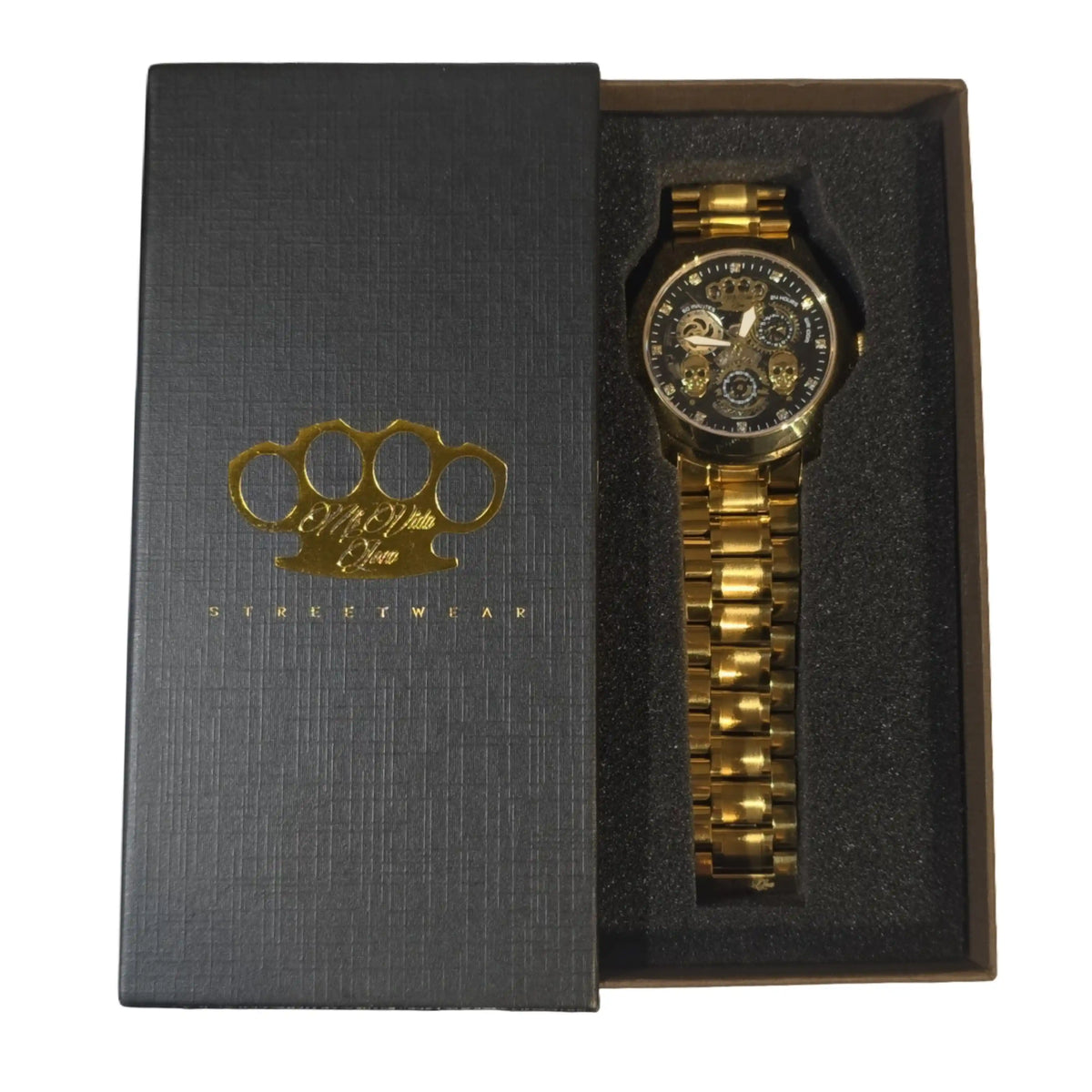 Reloj MVL Double skull oro/oro en la caja de regalo negra abierta con logo MVL dorado