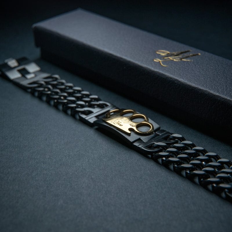 Mi Vida Loca Bracelet zwart/goud, zwarte schakelarmband met gouden MVL logo naast de zwarte box