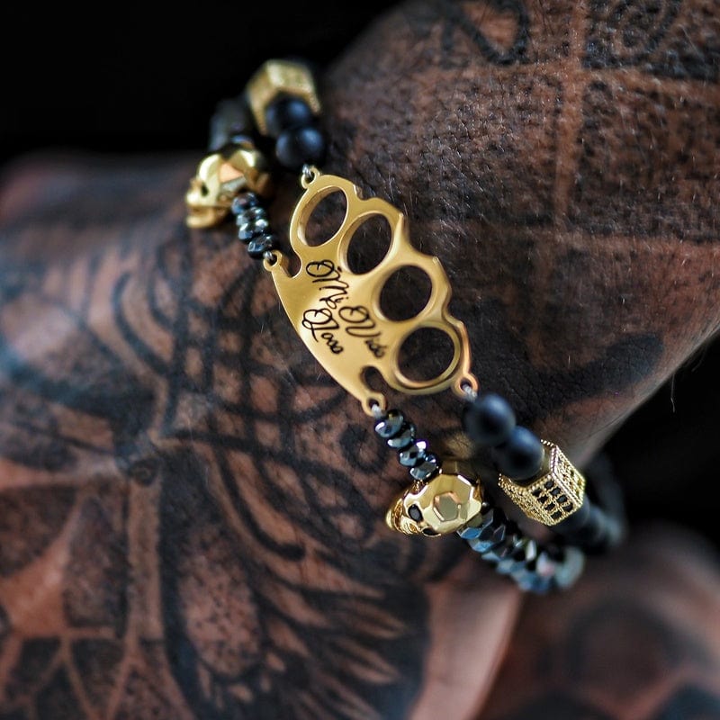 Bracciale MVL "Polygonal skulls" nero/oro